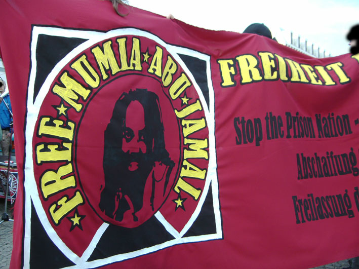 Mit Power durch die Mauer - FREE-MUMIA - Free Them ALL!