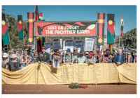 The Frontier Wars march at the Australian War Memorial on Anzac Day 2016. Over 550 locations of killings that took place across the continent were carried on yellow fabric measuring over 25 metres. 