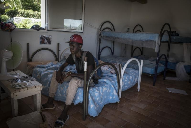 Ebrima Gaye in his room at the Frasca Centre in Rosolini (Jason Florio/IRIN)