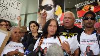 Carol Roe grandmother (l) and Della Roe (c), mother of Ms Dhu outside the coroner's court in Perth.