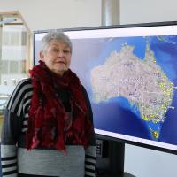 Professor Lyndall Ryan with her map of the Frontier Wars. (Image Credit University of Newcastle via the ABC)