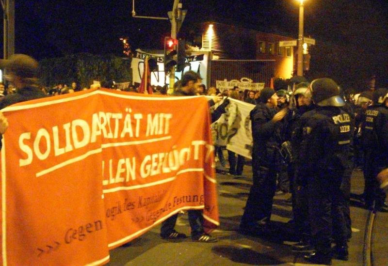 Protesters outside occupied hostel